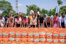 File image of Governor Ann Waiguru and the distributed gas cylinders